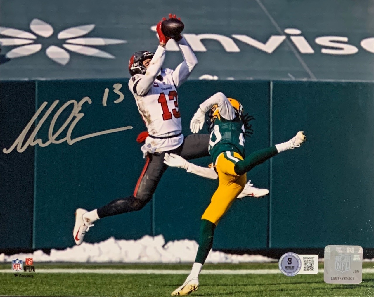 Mike Evans Autographed Tampa Bay Buccaneers Signed Football 8x10 Photo Beckett COA