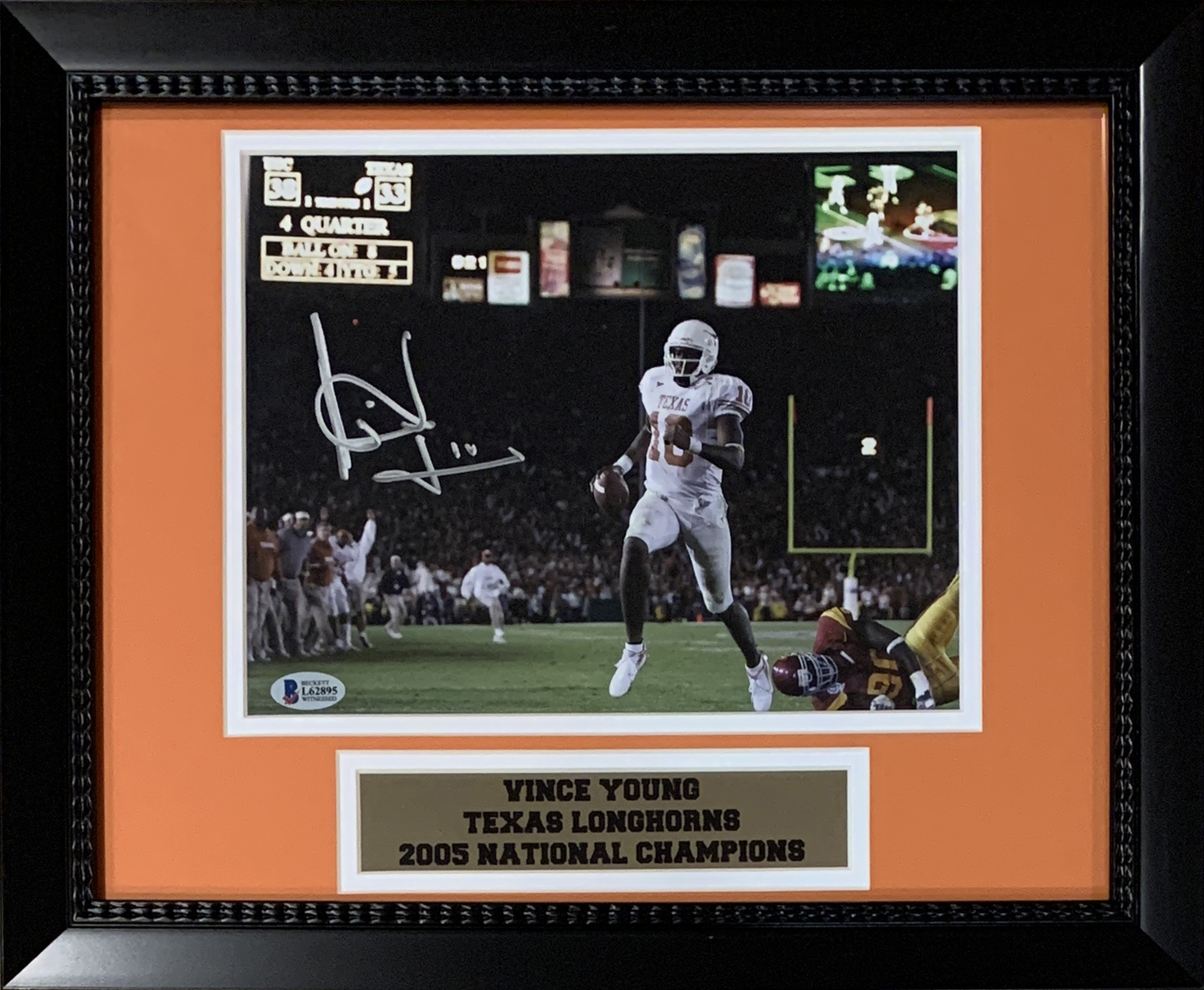 Vince Young Texas 2005 National Champions Signed Football Framed 8x10 Photo Beckett COA Vince Young Texas 2005 National Champions Signed Football Framed 8x10 Photo Beckett COA